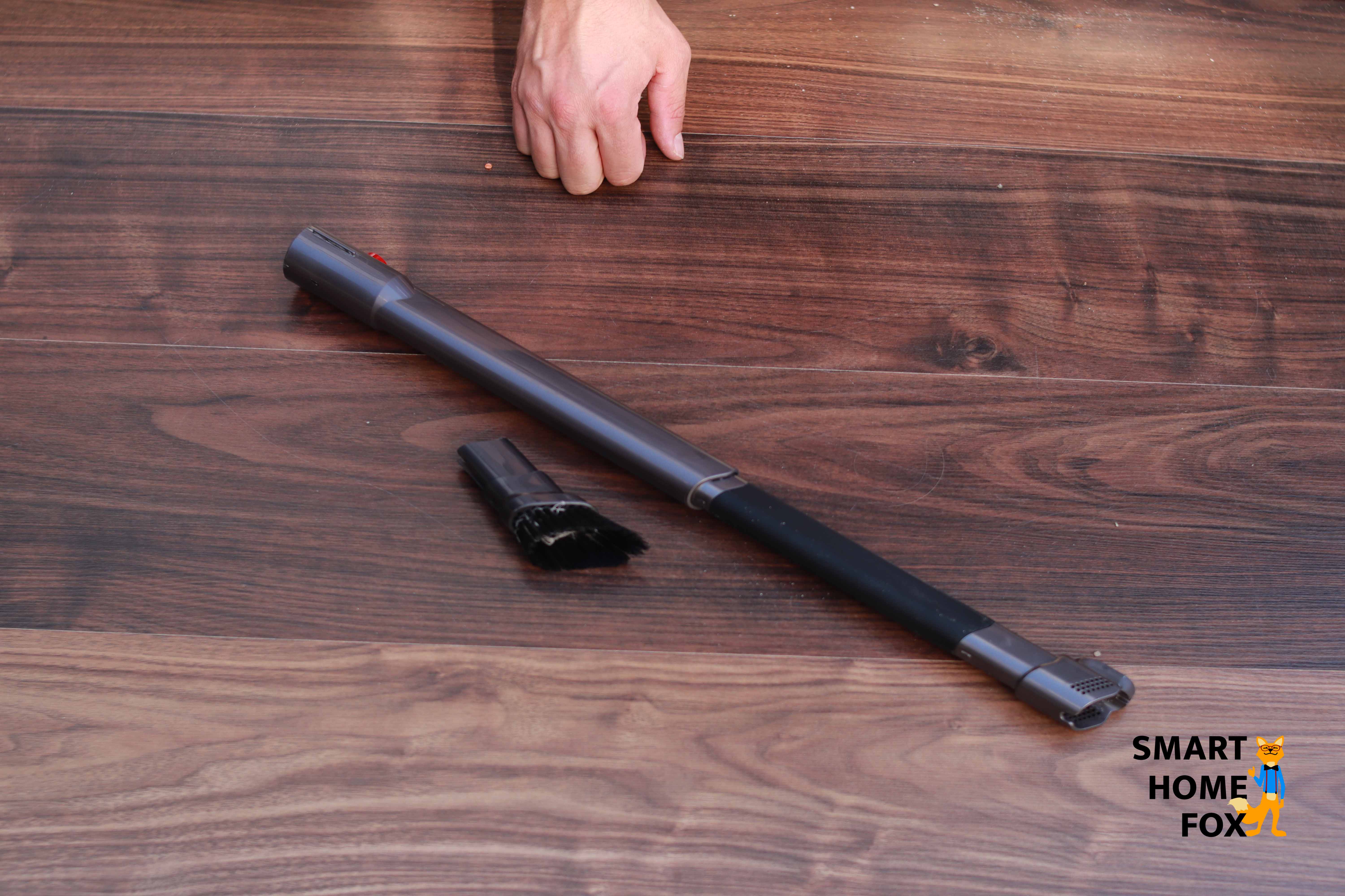 The extension with brush of the Dyson V7 Motorhead fully pulled out